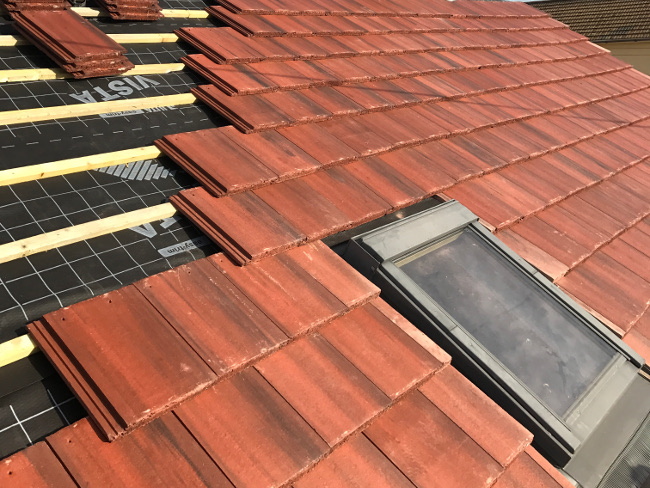 New tile roofinstallation underway in Cheadle.