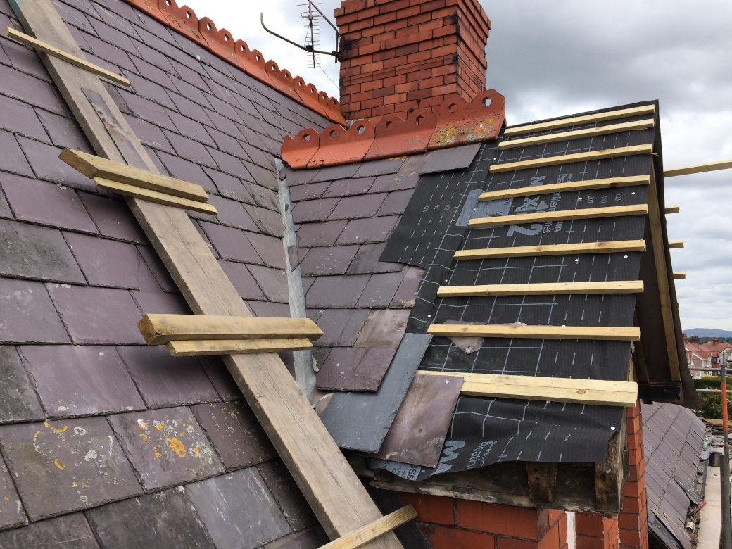 Slective roof repair of slate roof in Cheadle Hulme.