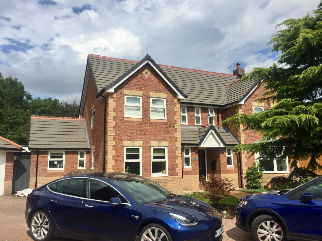 New tile roof to a house in Cheadle Hulme by Cheadle Roof Repairs.