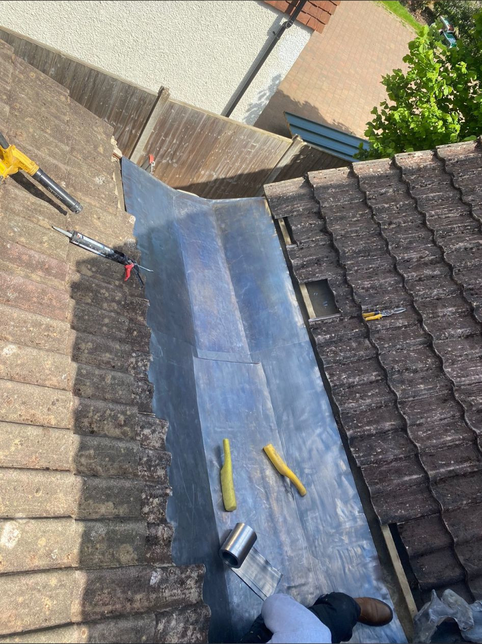 Fabricating leadwork into new valley.